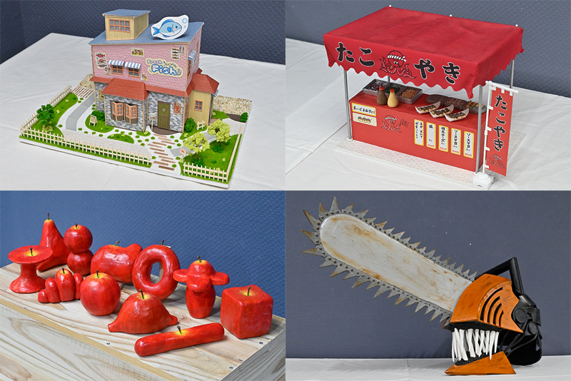 左上：サーモンをモチーフにしたオリジナルセット模型
右上：ミニチュア模型「たこやき屋台」
左下：絵本を基にした造形物「りんごのきょうだい」
右下：アニメに出てくるマスクをイメージした造形物